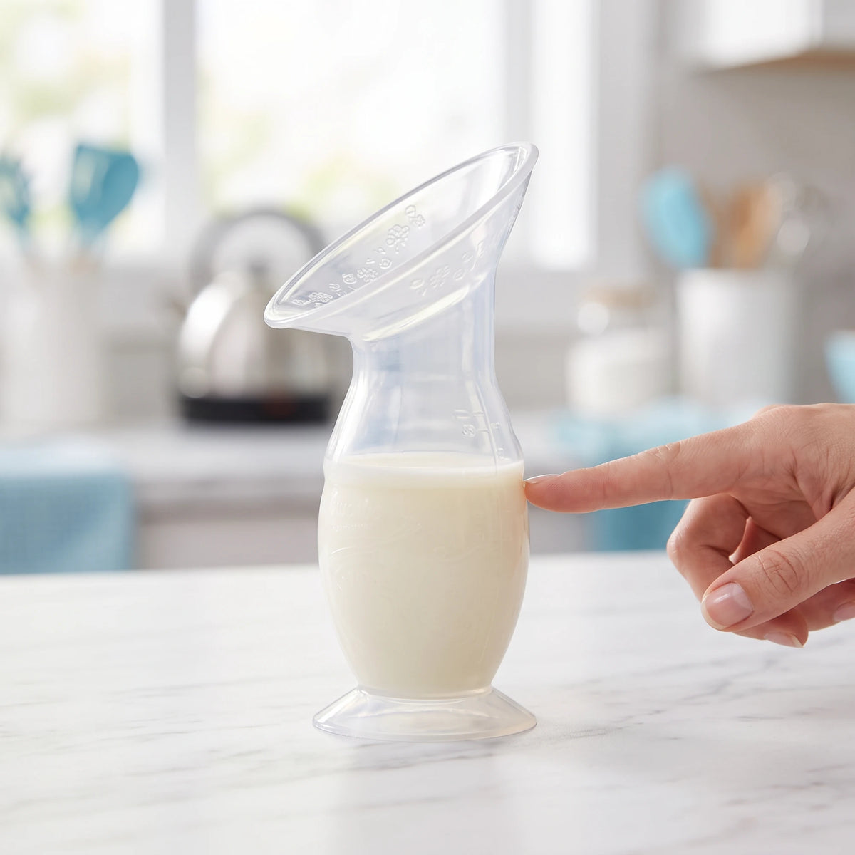 Colector de leche OWAWA con base de succión sobre la mesa